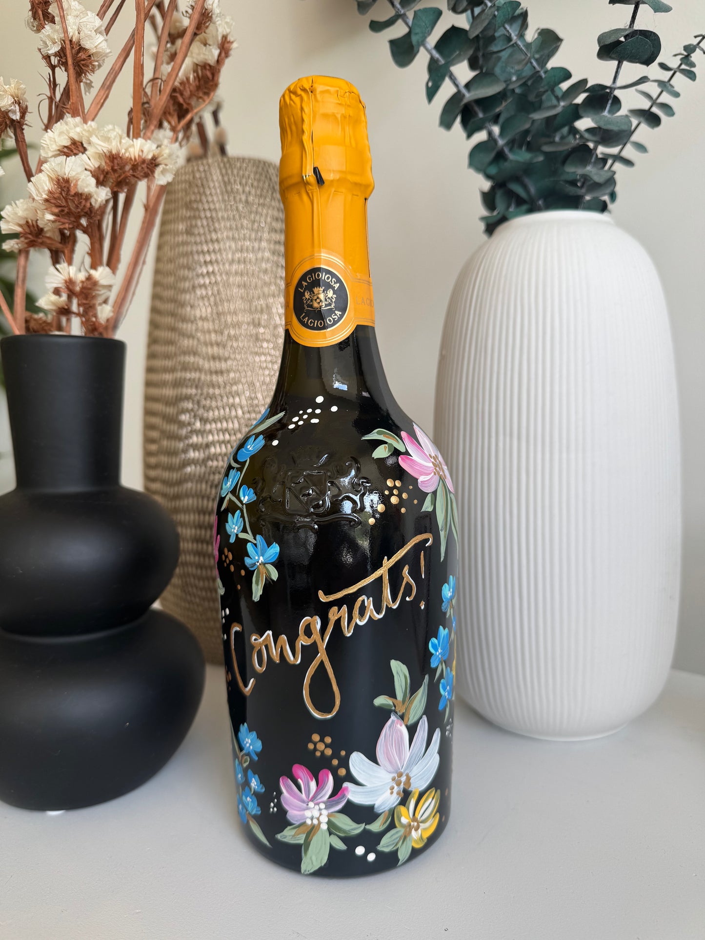 custom painted bottle with personalised hand painted design