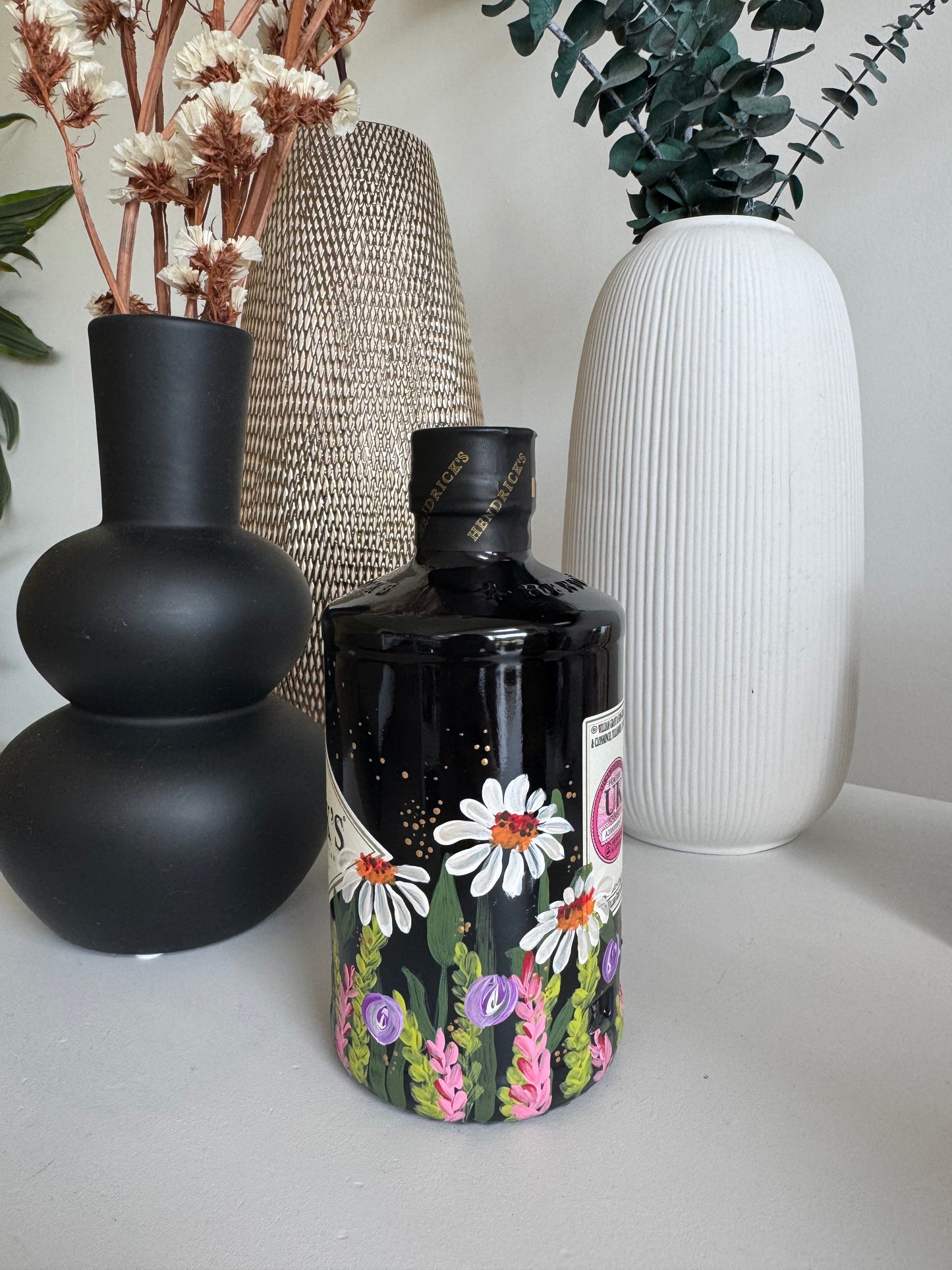 custom painted bottle with personalised hand painted design