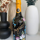 custom painted bottle with personalised hand painted design